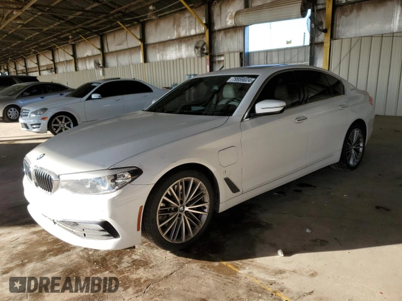 2018 BMW 5 Series 530e with VIN WBAJA9C53JG622997, listed as a Copart auction lot 79959024 with 127,486 mi miles and Salvage title. Bid and sale history available at DreamBid. Image 1.