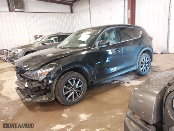 2017 Mazda CX-5 Grand Touring with VIN JM3KFBDLXH0206999, listed as a IAAI auction lot 41649611 with 73,382 mi miles. Bid and sale history available at carsss.com. Image 2.