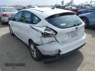 2015 Ford Focus SE with VIN 1FADP3K22FL315960, listed as a IAAI auction lot 41968426 with 184,726 mi miles. Bid and sale history available at carsss.com. Image 3.