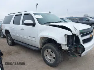 2014 Chevrolet Suburban LT with VIN 1GNSKJE77ER141415, listed as a IAAI auction lot 41617749 with 226,571 mi miles and . Bid and sale history available at DreamBid. Image 1.