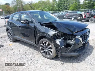 2019 Mazda CX-3 Touring z VIN JM1DKFC74K1418386, wystawiony jako IAAI lot #42265098 z przebiegiem 70 969 mil mil oraz . Historia ofert i sprzedaży dostępna na DreamBid. Obrazek 1.