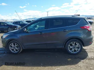 2016 Ford Escape Titanium with VIN 1FMCU9J96GUB96009, listed as a IAAI auction lot 41866127 with 132,990 mi miles and . Bid and sale history available at DreamBid. Image 15.