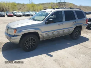 2001 Jeep Grand Cherokee Limited with VIN 1J4GW58N11C568908, listed as a Copart auction lot 55697175 with 214,491 mi miles and Clean Title. Bid and sale history available at DreamBid. Image 1.