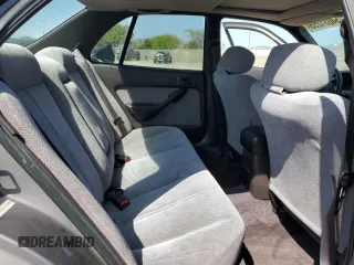 1994 Toyota Camry LE z VIN JT2GK12E6R0055565, wystawiony jako Copart lot #54031255 z przebiegiem 240 841 mil mil oraz Szkoda całkowita • Salvage title. Historia ofert i sprzedaży dostępna na DreamBid. Obrazek 10.