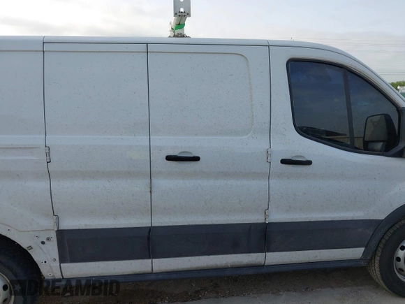 2020 Ford Transit Cargo z VIN 1FTYE1Y82LKB45974, wystawiony jako IAAI lot #42614744 z przebiegiem 200 241 mil mil oraz . Historia ofert i sprzedaży dostępna na DreamBid. Obrazek 13.