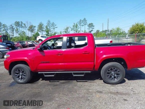 2022 Toyota Tacoma SR with VIN 3TMCZ5AN7NM470900, listed as a IAAI auction lot 42060911 with 38,869 mi miles and . Bid and sale history available at DreamBid. Image 14.