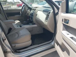 2009 Mercury Mariner Premier z VIN 4M2CU97779KJ00665, wystawiony jako IAAI lot #42698060 z przebiegiem 162 205 mil mil oraz . Historia ofert i sprzedaży dostępna na DreamBid. Obrazek 5.