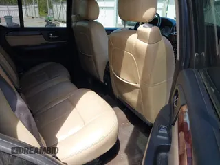 2007 GMC Envoy SLE with VIN 1GKDT13S372103718, listed as a IAAI auction lot 41886111 with 238,423 mi miles. Bid and sale history available at carsss.com. Image 8.