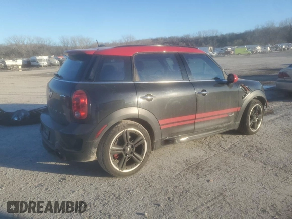 2015 MINI Countryman John Cooper Works with VIN WMWXD1C5XFWS34732, listed as a Copart auction lot 42402185 with Not Provided miles and Salvage Title. Bid and sale history available at DreamBid. Image 3.