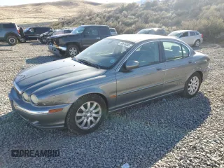 2003 Jaguar X-Type 2.5L Manual z VIN SAJEA51D33XD36971, wystawiony jako Copart lot #50616585 z przebiegiem 89 374 mil mil oraz Czysty tytuł • Clean title. Historia ofert i sprzedaży dostępna na DreamBid. Obrazek 1.