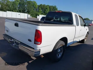 2003 Ford F-150 XL with VIN 1FTRX17W13NB93902, listed as a IAAI auction lot 42670081 with 145,918 mi miles and . Bid and sale history available at DreamBid. Image 4.
