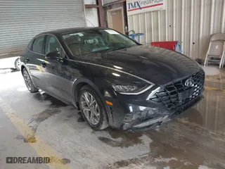 2023 Hyundai Sonata SEL with VIN KMHL64JA8PA270894, listed as a IAAI auction lot 41884303 with 51,410 mi miles. Bid and sale history available at carsss.com. Image 1.