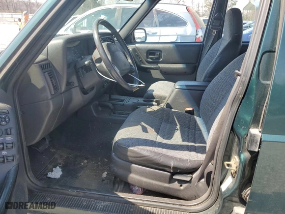2001 Jeep Cherokee Sport with VIN 1J4FF48S71L574658, listed as a Copart auction lot 49113215 with 208,626 mi miles and Salvage Title. Bid and sale history available at carsss.com. Image 7.
