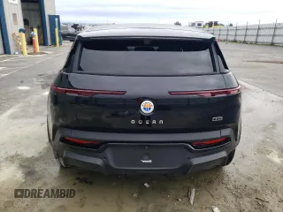 2023 Fisker Ocean One z VIN VCF1ZBU22PG002044, wystawiony jako Copart lot #84522334 z przebiegiem Nie podano mil oraz Szkody całkowita. Historia ofert i sprzedaży dostępna na DreamBid. Obrazek 6.