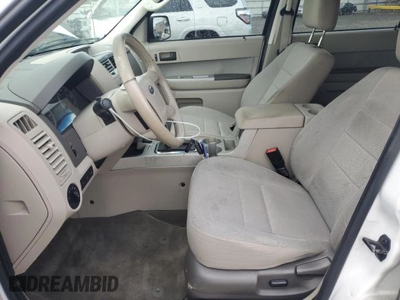 2011 Ford Escape Hybrid z VIN 1FMCU5K39BKA88197, wystawiony jako Copart lot #50896195 z przebiegiem 186 007 mil mil oraz Czysty tytuł • Clean title. Historia ofert i sprzedaży dostępna na DreamBid. Obrazek 7.