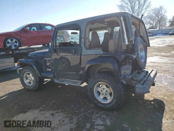 2001 Jeep Wrangler Sahara with VIN 1J4FA59S81P345126, listed as a Copart auction lot 88213245 with 152,211 mi miles and Salvage Title. Bid and sale history available at carsss.com. Image 2.