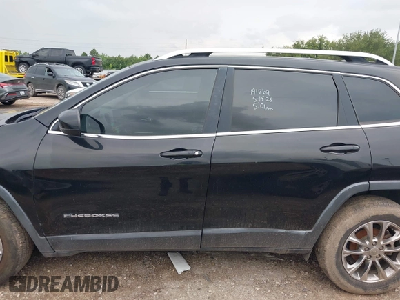 2019 Jeep Cherokee Latitude Plus with VIN 1C4PJLLB4KD176071, listed as a IAAI auction lot 42638016 with 99,401 mi miles and . Bid and sale history available at DreamBid. Image 14.