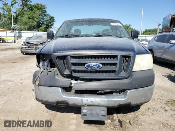 2005 Ford F-150 XL with VIN 1FTRF12W85NB33192, listed as a Copart auction lot 57240225 with 104,331 mi miles and Salvage title. Bid and sale history available at DreamBid. Image 5.