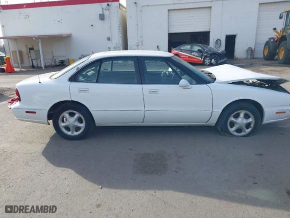 1999 Oldsmobile 88 LS with VIN 1G3HN52K0X4837561, listed as a IAAI auction lot 41414590 with NaN miles. Bid and sale history available at carsss.com. Image 14.