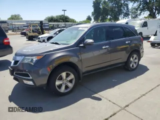 2011 Acura MDX z VIN 2HNYD2H2XBH503715, wystawiony jako Copart lot #61996595 z przebiegiem 179 274 mil mil oraz Czysty tytuł • Clean title. Historia ofert i sprzedaży dostępna na DreamBid. Obrazek 1.