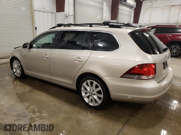 2014 Volkswagen Jetta TDI w/Sunroof & Nav with VIN 3VWPL7AJ0EM611721, listed as a Copart auction lot 86724684 with 127,030 mi miles and Salvage title. Bid and sale history available at DreamBid. Image 2.