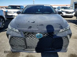 2021 Toyota Avalon Hybrid XSE z VIN 4T1EA1AB6MU010650, wystawiony jako Copart lot #83424894 z przebiegiem 37 294 mil mil oraz Szkoda całkowita • Salvage title. Historia ofert i sprzedaży dostępna na DreamBid. Obrazek 5.