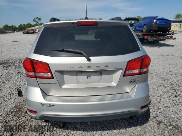 2014 Dodge Journey SXT z VIN 3C4PDCBG7ET126901, wystawiony jako Copart lot #52882625 z przebiegiem 176 923 mil mil oraz Szkoda całkowita • Salvage title. Historia ofert i sprzedaży dostępna na DreamBid. Obrazek 6.