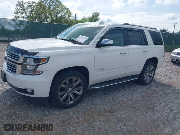 2016 Chevrolet Tahoe LTZ z VIN 1GNSKCKC7GR243183, wystawiony jako IAAI lot #41939209 z przebiegiem 81 903 mil mil oraz . Historia ofert i sprzedaży dostępna na DreamBid. Obrazek 2.
