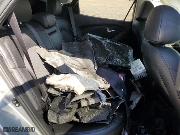 2013 Hyundai Tucson GLS with VIN KM8JU3AC1DU663090, listed as a Copart auction lot 48874295 with 0 mi miles and Salvage Title. Bid and sale history available at carsss.com. Image 11.