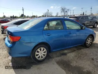 2010 Toyota Corolla z VIN 1NXBU4EE0AZ174665, wystawiony jako Copart lot #52187365 z przebiegiem 121 769 mil mil oraz Szkoda całkowita • Salvage title. Historia ofert i sprzedaży dostępna na DreamBid. Obrazek 3.