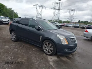2010 Cadillac SRX Premium Collection z VIN 3GYFNFEY0AS606366, wystawiony jako IAAI lot #42324952 z przebiegiem 187 341 mil mil oraz . Historia ofert i sprzedaży dostępna na DreamBid. Obrazek 1.