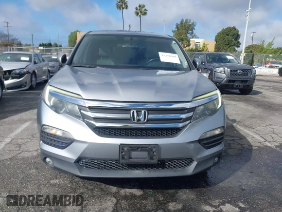 2016 Honda Pilot EX-L with VIN 5FNYF5H57GB038349, listed as a IAAI auction lot 41378569 with 117,651 mi miles and . Bid and sale history available at DreamBid. Image 12.