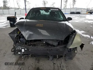 2003 Ford Focus ZX3 with VIN 3FAFP31Z73R178518, listed as a Copart auction lot 50200105 with 317,147 mi miles and Salvage title. Bid and sale history available at DreamBid. Image 5.