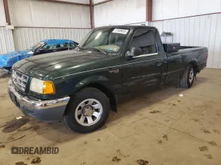 2003 Ford Ranger XL with VIN 1FTYR10U43TA09143, listed as a Copart auction lot 57809055 with 116,856 mi miles and Salvage title. Bid and sale history available at DreamBid. Image 1.