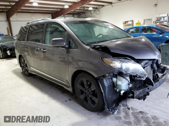 2011 Toyota Sienna SE with VIN 5TDXK3DCXBS159705, listed as a Copart auction lot 52173115 with 134,100 mi miles and Salvage Title. Bid and sale history available at carsss.com. Image 4.