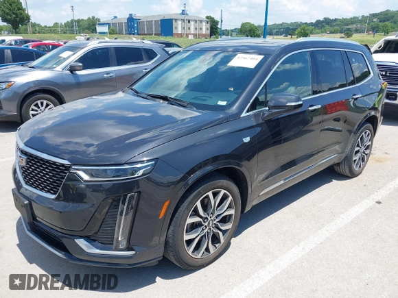 2020 Cadillac XT6 FWD Premium Luxury with VIN 1GYKPCRS0LZ220243, listed as a IAAI auction lot 42567404 with 45,643 mi miles and . Bid and sale history available at DreamBid. Image 18.