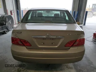 2003 Toyota Avalon XL z VIN 4T1BF28B03U280486, wystawiony jako Copart lot #57152935 z przebiegiem 131 996 mil mil oraz Szkoda całkowita • Salvage title. Historia ofert i sprzedaży dostępna na DreamBid. Obrazek 6.