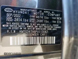 2023 Genesis G70 2.0T z VIN KMTG34TA6PU113067, wystawiony jako Copart lot #55523925 z przebiegiem 30 942 mil mil oraz Szkoda całkowita • Salvage title. Historia ofert i sprzedaży dostępna na DreamBid. Obrazek 13.