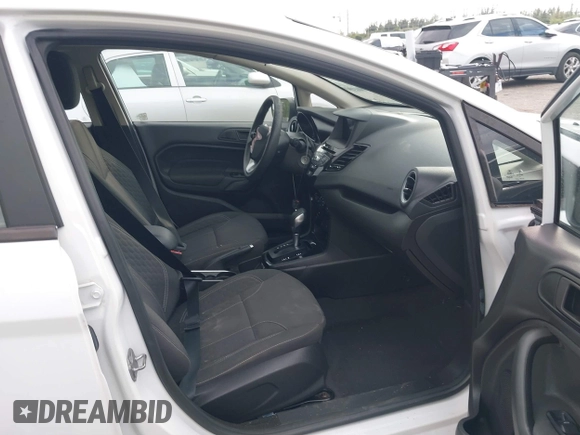 2019 Ford Fiesta SE z VIN 3FADP4EJ5KM132862, wystawiony jako IAAI lot #40893430 z przebiegiem 91 011 mil mil oraz . Historia ofert i sprzedaży dostępna na DreamBid. Obrazek 5.