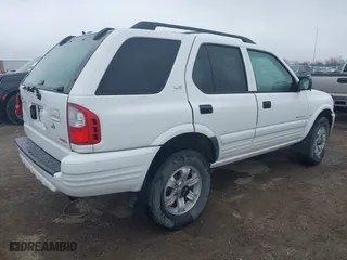 2001 Isuzu Rodeo S with VIN 4S2DM58WX14315138, listed as a IAAI auction lot 41535619 with 217,960 mi miles. Bid and sale history available at carsss.com. Image 4.