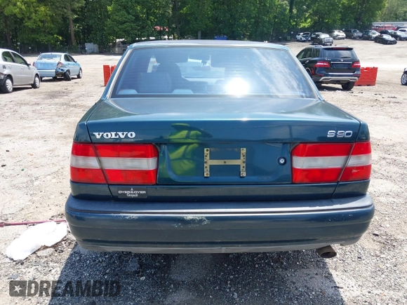 1998 Volvo S90 z VIN YV1KS9605W1128293, wystawiony jako IAAI lot #42332645 z przebiegiem 252 576 mil mil oraz . Historia ofert i sprzedaży dostępna na DreamBid. Obrazek 16.