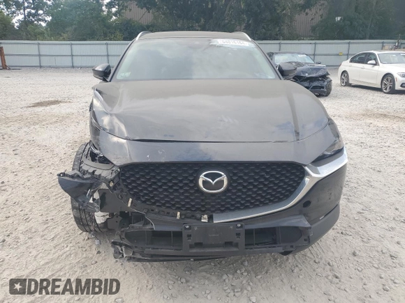 2023 Mazda CX-30 2.5 S Premium Package with VIN 3MVDMBDMXPM501188, listed as a Copart auction lot 64816164 with 0 mi miles and Salvage Title. Bid and sale history available at carsss.com. Image 5.