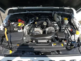 2023 Jeep Wrangler Sport with VIN 1C4HJXDGXPW596127, listed as a Copart auction lot 65395655 with 64,257 mi miles and Salvage title. Bid and sale history available at DreamBid. Image 12.