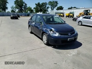 2010 Nissan Versa S with VIN 3N1BC1AP4AL362129, listed as a Copart auction lot 58755525 with 121,878 mi miles and Salvage title. Bid and sale history available at DreamBid. Image 13.