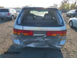 2004 Honda Odyssey EX-L with VIN 5FNRL18964B025323, listed as a IAAI auction lot 40714457 with 164,786 mi miles and . Bid and sale history available at DreamBid. Image 6.