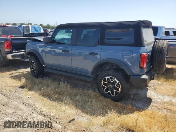 2023 Ford Bronco z VIN 1FMDE5BHXPLA99837, wystawiony jako Copart lot #56073885 z przebiegiem 9 679 mil mil oraz Szkoda całkowita • Salvage title. Historia ofert i sprzedaży dostępna na DreamBid. Obrazek 2.