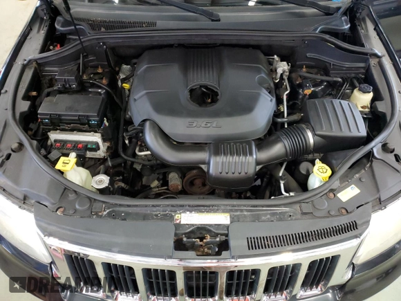 2011 Jeep Grand Cherokee Laredo with VIN 1J4RR4GG9BC521723, listed as a Copart auction lot 64126795 with 198,145 mi miles and Clean title. Bid and sale history available at DreamBid. Image 12.