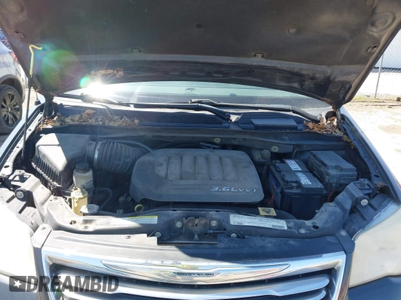 2012 Chrysler Town & Country Touring with VIN 2C4RC1BG9CR313105, listed as a IAAI auction lot 41971919 with 165,986 mi miles. Bid and sale history available at carsss.com. Image 10.