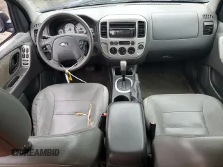 2005 Ford Escape XLT with VIN 1FMYU93165KD64012, listed as a Copart auction lot 77696623 with 144,630 mi miles and Non Repairable. Bid and sale history available at carsss.com. Image 8.