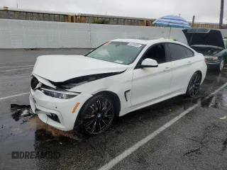2018 BMW 4 Series 440i with VIN WBA4J5C54JBF07105, listed as a Copart auction lot 45203205 with 62,112 mi miles and Salvage Title. Bid and sale history available at carsss.com. Image 1.